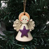 Teeny little ceramic angel Christmas decoration purple star design pottery angel