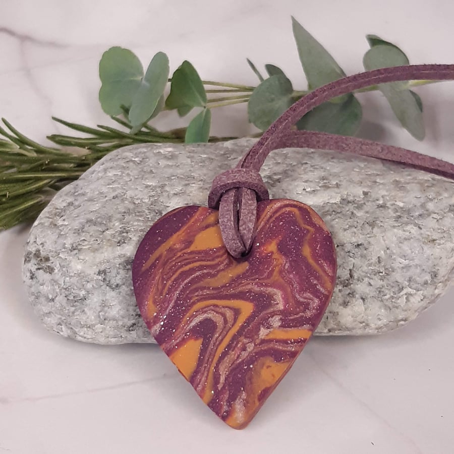 Purple, orange and gold heart shaped pendant