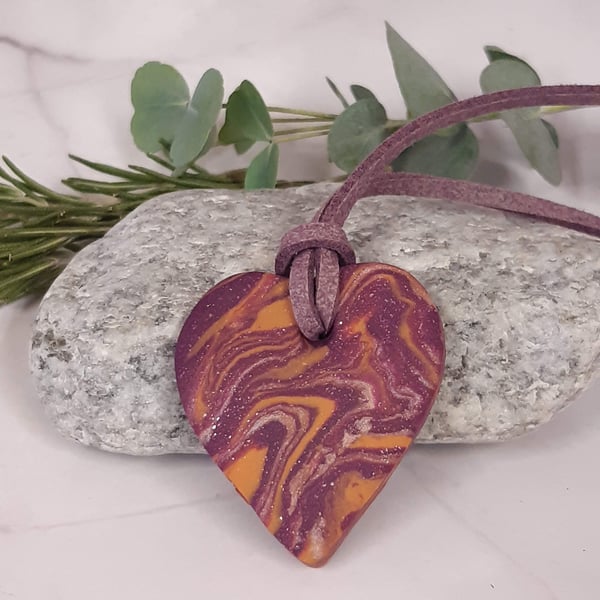 Purple, orange and gold heart shaped pendant