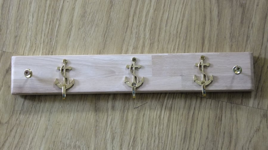 WOODEN COAT OR CLOTHES RACK WITH THREE BRASS ANCHORS IDEAL FOR SAILOR 