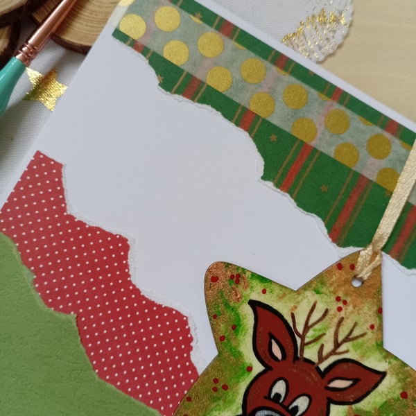 Christmas card with a wooden reindeer decoration
