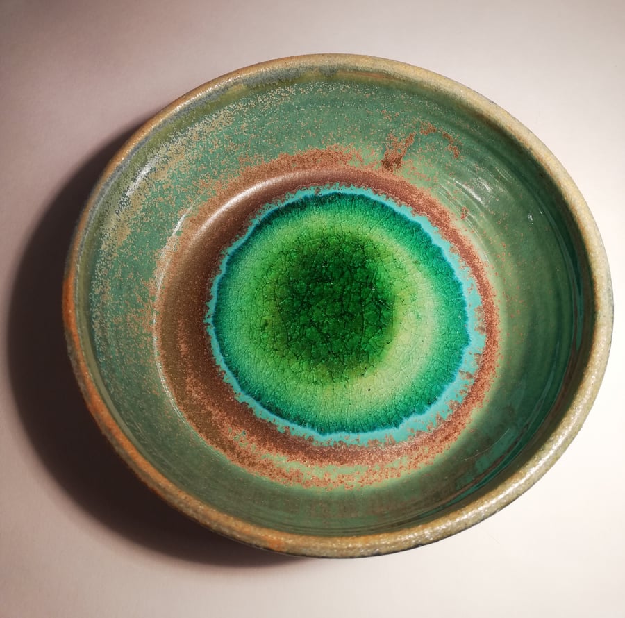 Iridescent green ceramic bowl