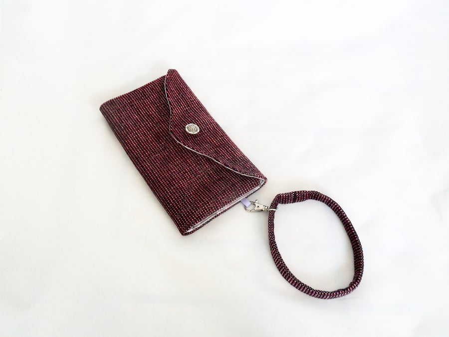 Pink and purple clutch wallet. 