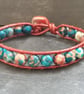 Red and blue rainbow jasper and leather bracelet with ceramic button fastener - Image 4