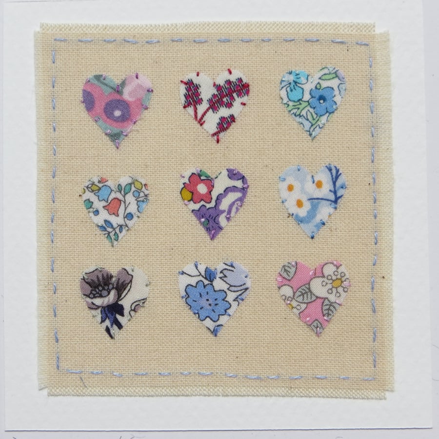 Miniature hand-stitched applique hearts - entitled 'Lots of Love'