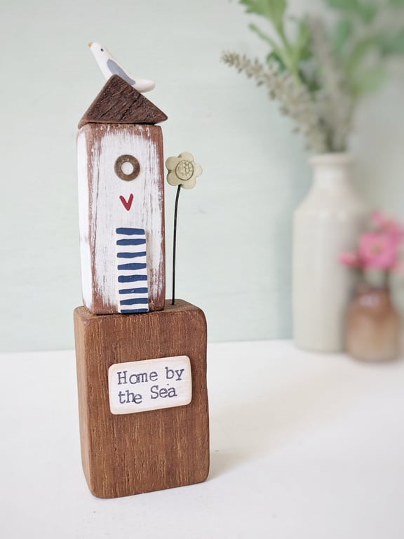 Tall Wooden Sea Hut with Clay Flower and Seagull 'Home by the Sea'