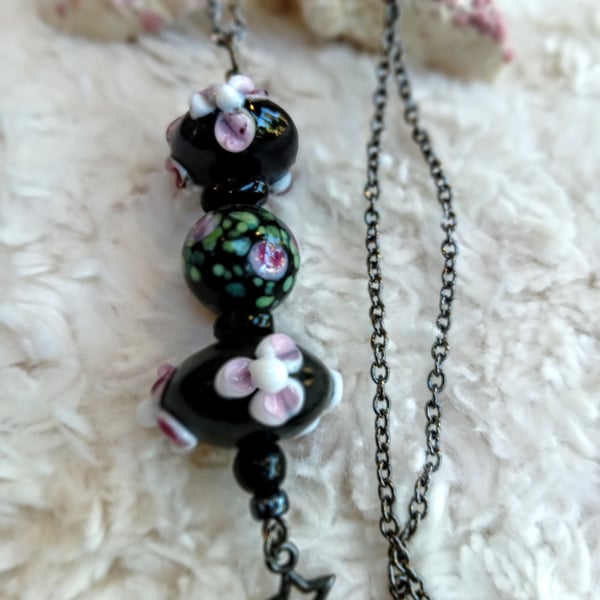 Hand-made floral black Lampwork glass beaded pendant on gunmetal chain NECKLACE