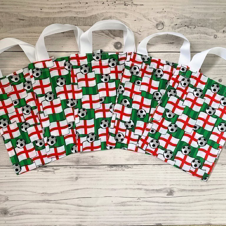 Football themed party bags. Small tote bags. Gift bags with handles. 