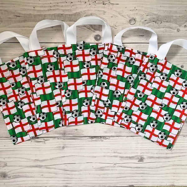 Football themed party bags. Small tote bags. Gift bags with handles. 