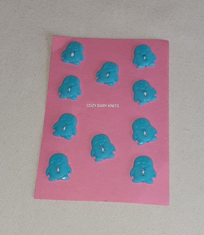 BLUE PENGUIN SHAPED BUTTONS WITH TWO HOLES FOR ATTACHING 