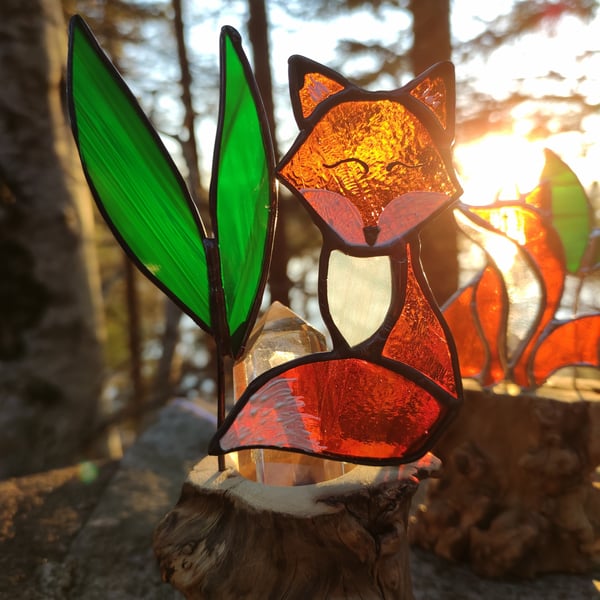 Hand made stained glass fox on a light up tree stump