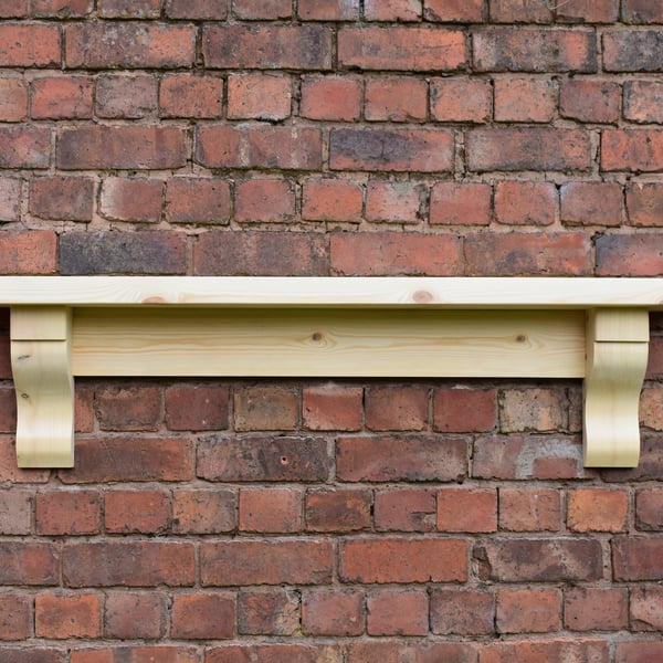 Chunky solid pine mantle shelf with corbels and a 45mm top. 