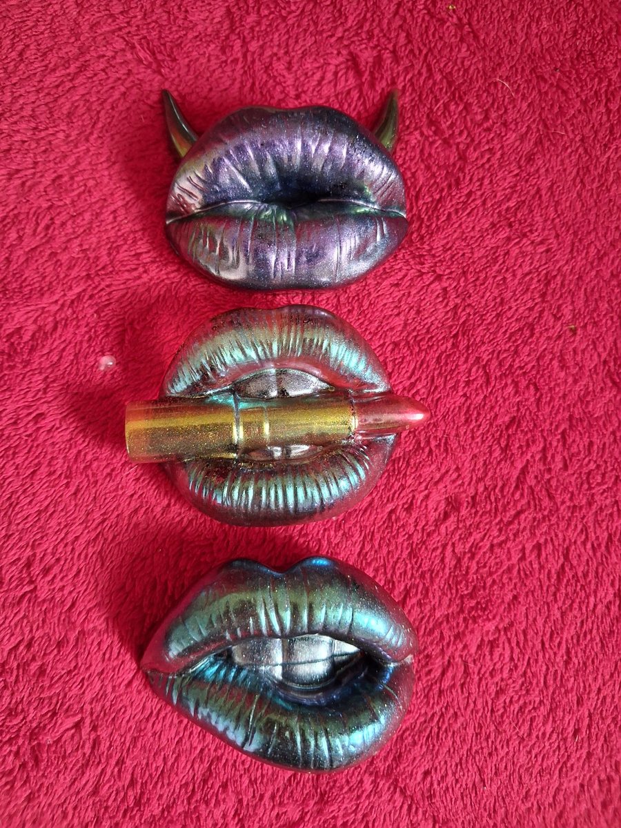 Handmade epoxy resin fridge magnet 'lips'.