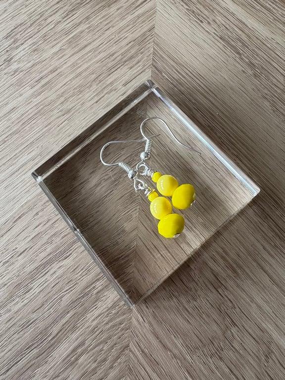 Bright yellow earrings 