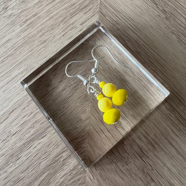 Bright yellow earrings 