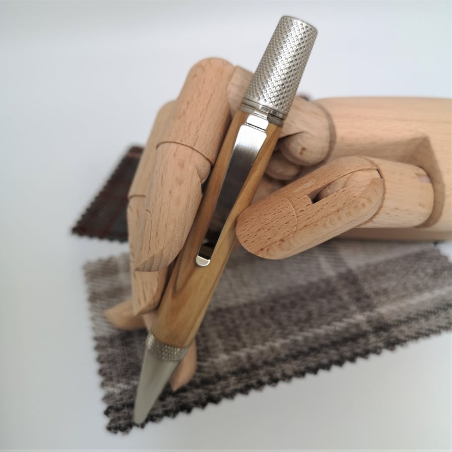 Woodturned Pen in Olive wood with brushed steel trims 