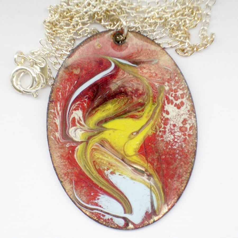 large oval pendant - scrolled white, yellow and pale blue over red