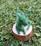 Mossy Dragon Hatchling on a Woodslice - Image 2