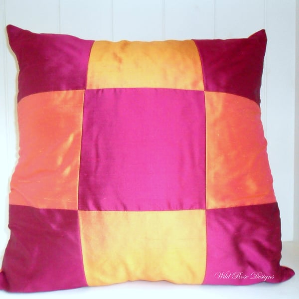  Cerise and orange  Silk cushion. 