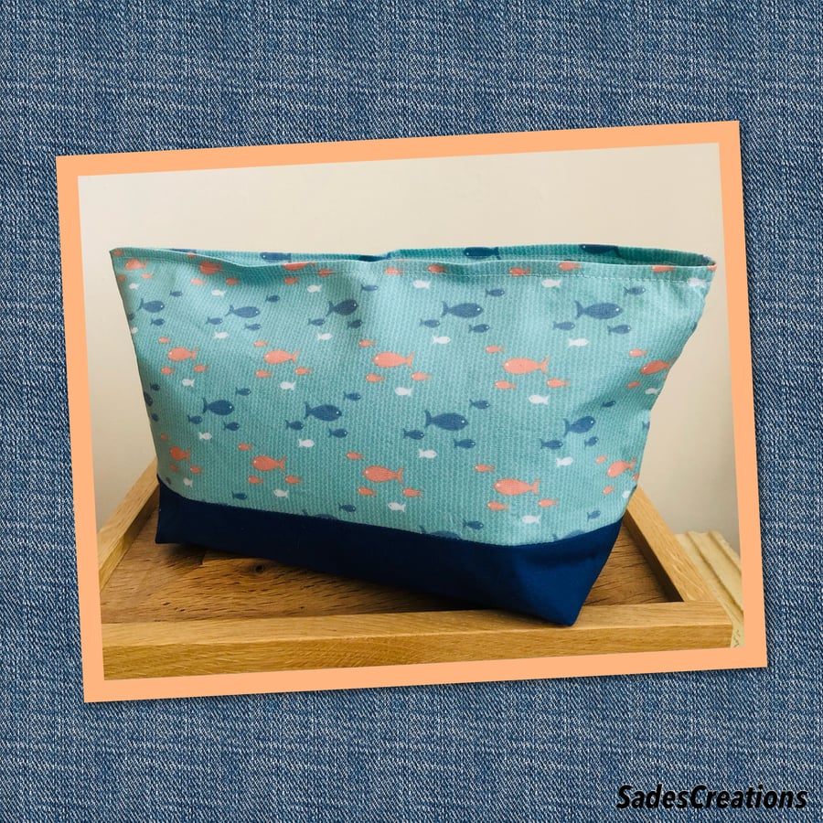 Cosmetic bag. Fully lined with inside pocket.