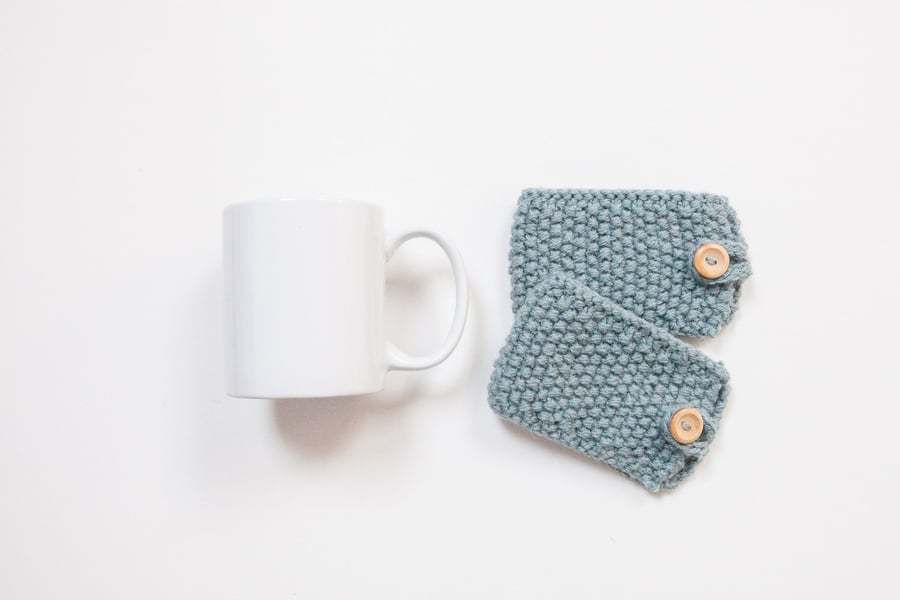Pair of knitted mug cosies, cup cosy, coffee cosy in Dusky Blue. Coffee mug cosy