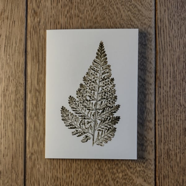 Fern. Image made on a printing press.