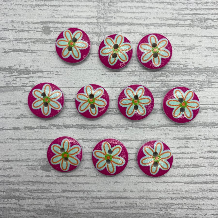 10 round buttons in pink with flower design