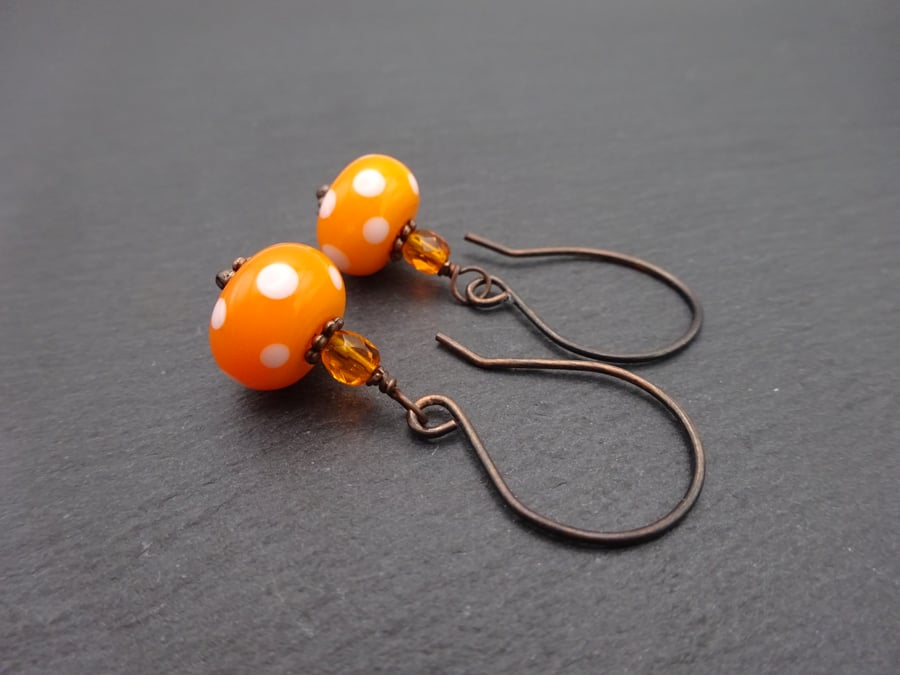 copper earrings, orange polka dot lampwork glass