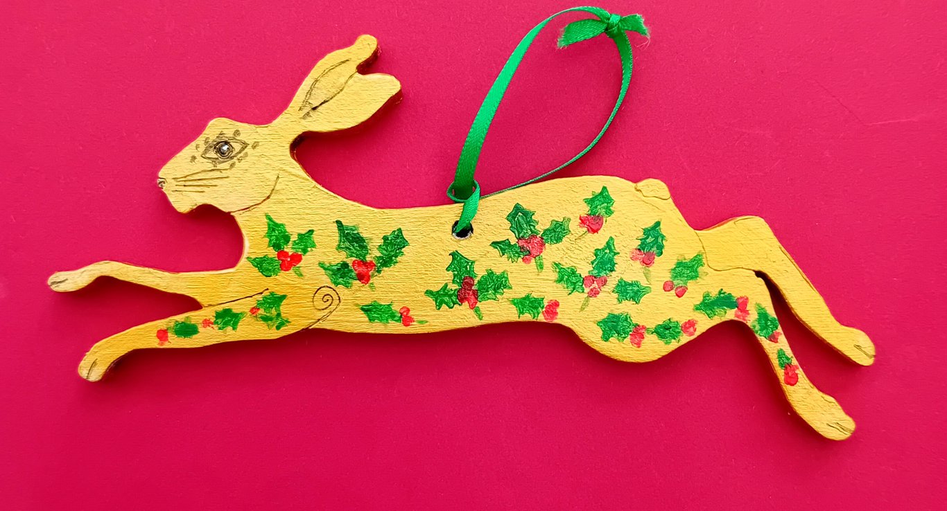 golden holly hare  hand painted on wood