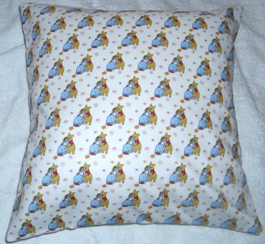 Winnie the Pooh and Eeyore sitting together cushion
