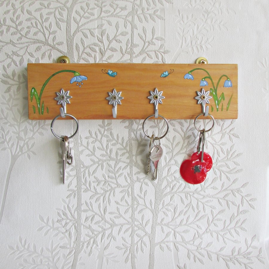 Key Hook, wooden with 4 metal daisy hooks, painted with flowers.