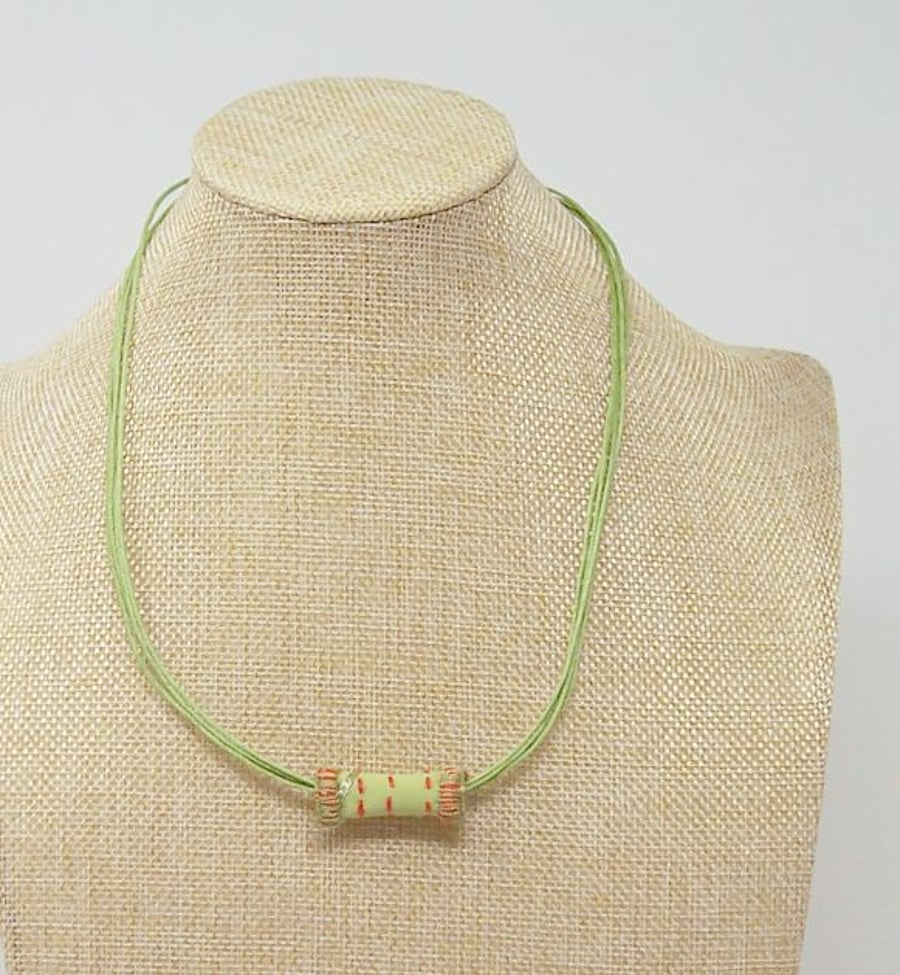Embroidered fabric bead necklace with waxed cotton cord