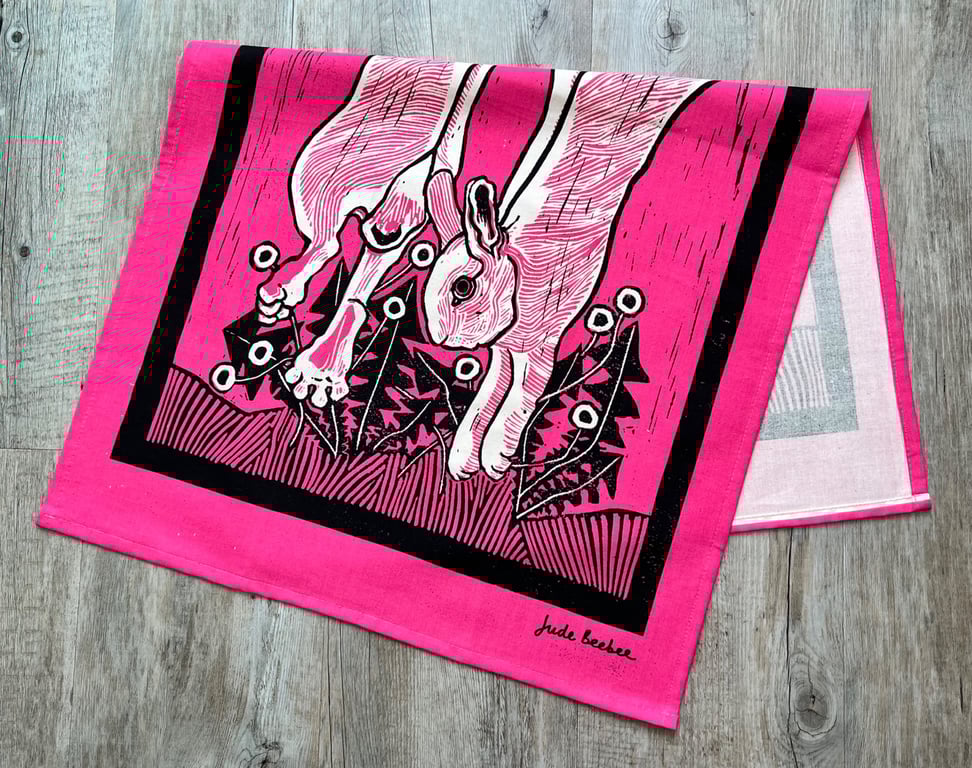 "Leap for Joy" tea towel - rabbit screen print in hot pink and black inks