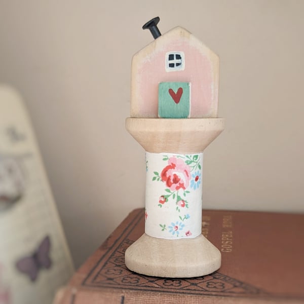 Little Wooden House on a Floral Wooden Bobbin 