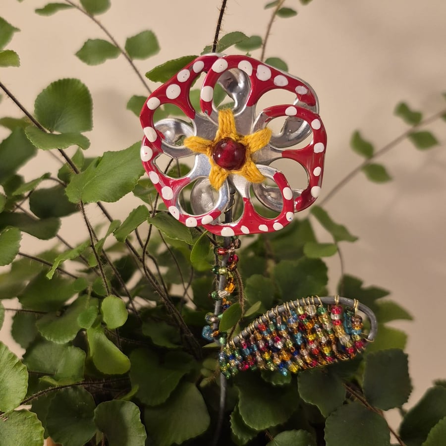 Red, white spotted & red flower plant companion perfect for pot plants