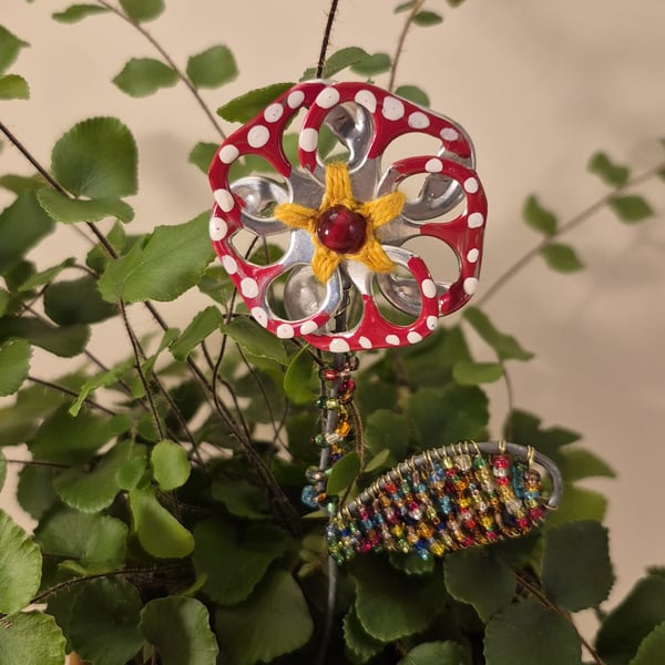 Red, white spotted & red flower plant companion perfect for pot plants