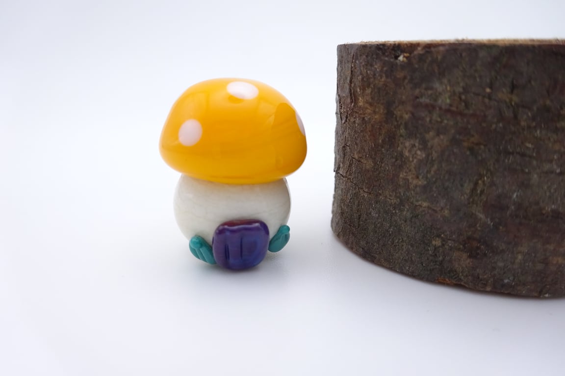 small glass toadstool house