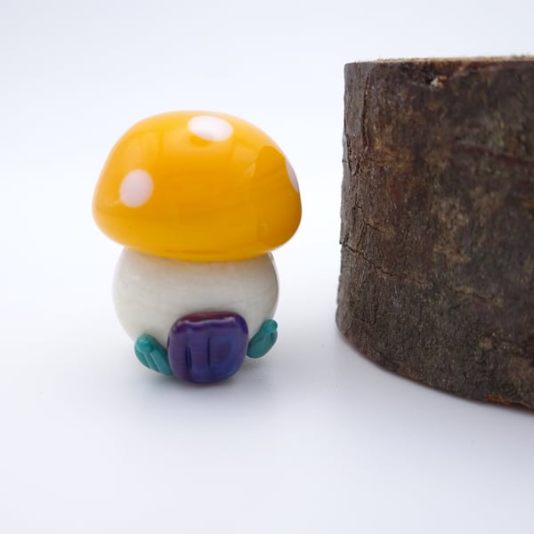 small glass toadstool house