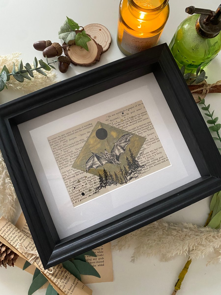 Original book page art with a flying Bat