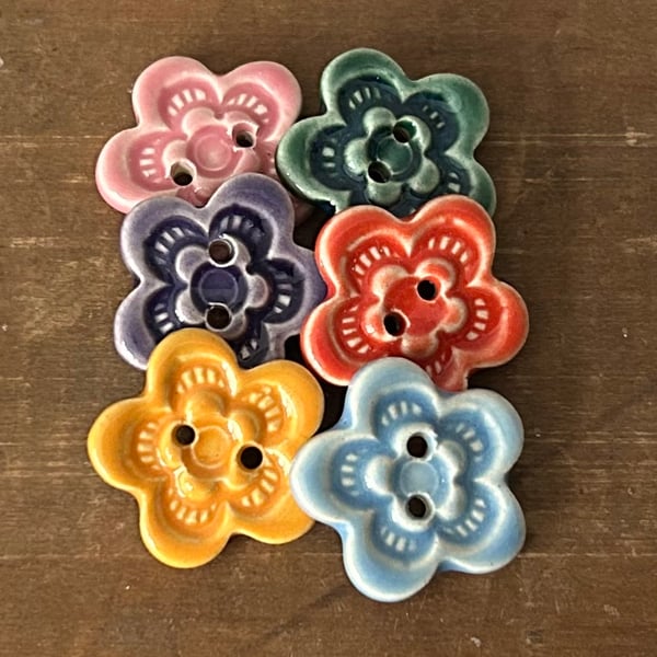 Set of six little handmade ceramic flower buttons multi coloured