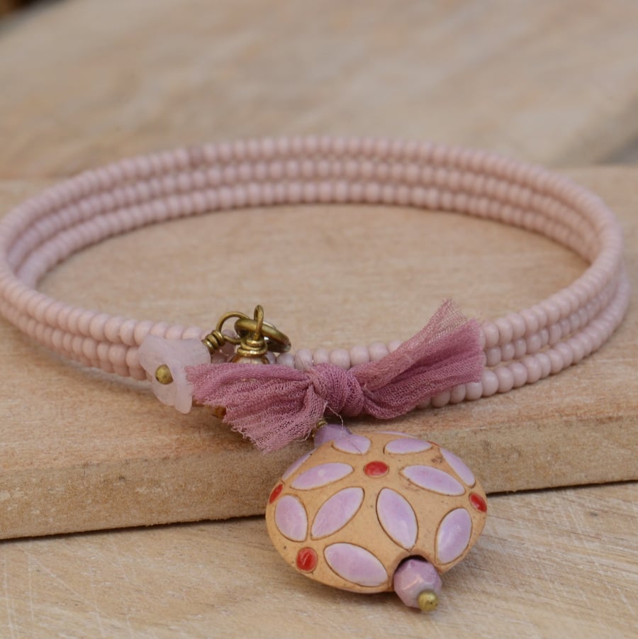 Memory Wire Pink Seed Bead Bracelet with Golem Ceramic Bead & Flowers