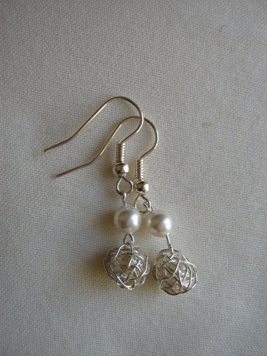 Pearl and silver wire wrapped earrings