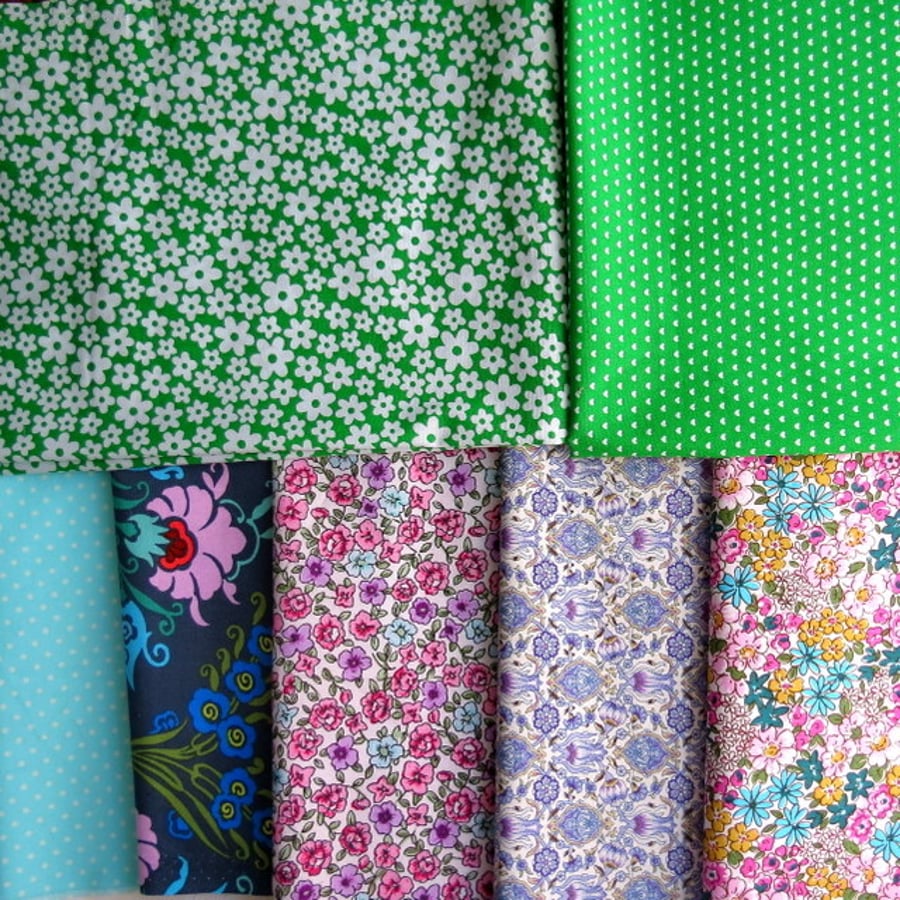 Fabric bundle.  7 good sized pieces of fabric for craft projects.  Cotton.
