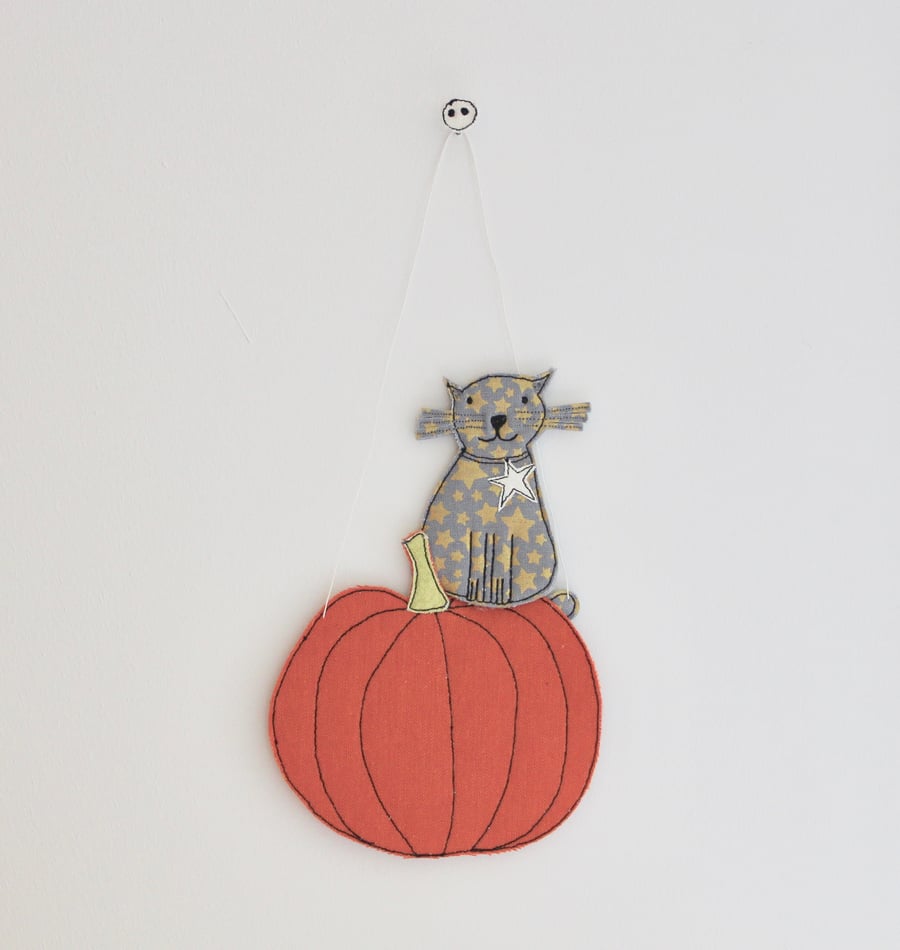 'Little Cat Sitting on a Pumpkin' - Hanging Decoration