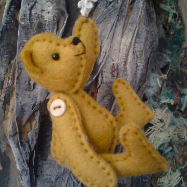Snowflake Bear, 4" woolfelt button jointed Christmas bear & crocheted snowflake