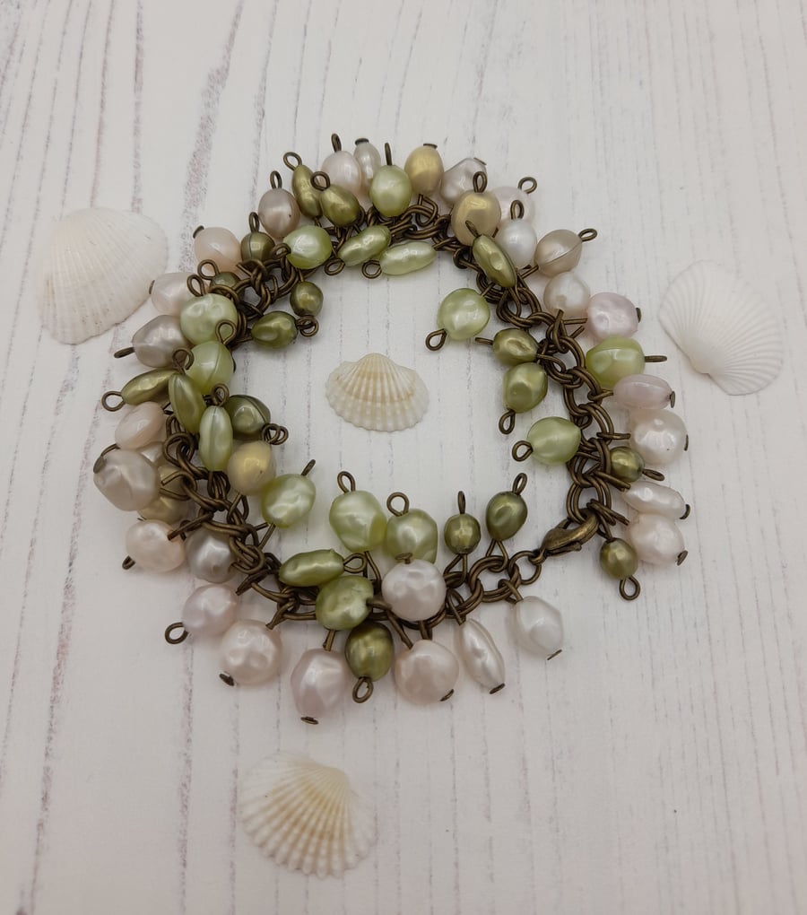 White and green faux pearl chain bracelet