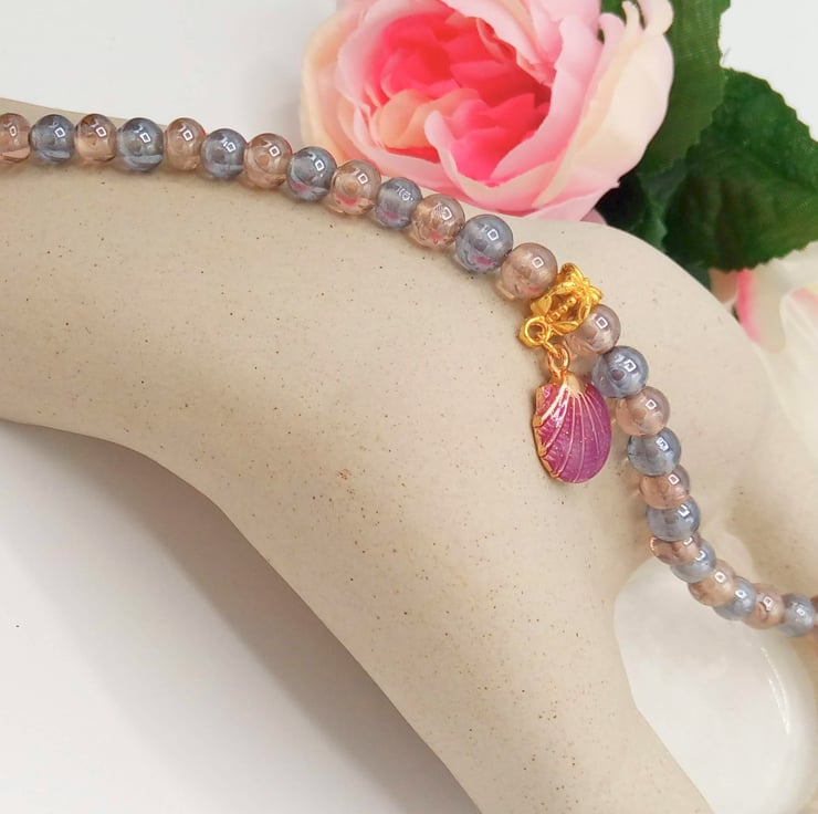 Purple Glass Bead Bracelet With An Enamel Clam Folksy