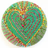One inch badge