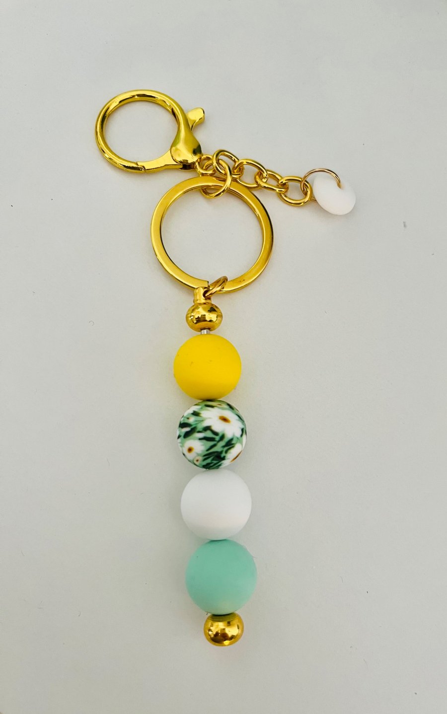 Daisy flowers  and pastel toned  keyring  or purse charm 