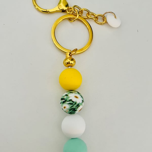 Daisy flowers  and pastel toned  keyring  or purse charm 